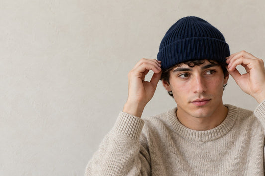 Adjusting a navy merino beanie